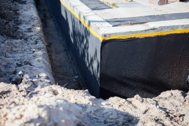 Professional Basement Waterproofing technician working in Knox, PA